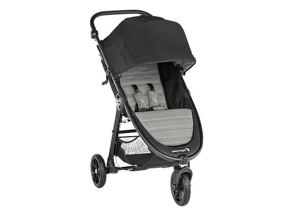 Baby Jogger City Mini GT2 stroller in black on a city sidewalk with all-terrain wheels