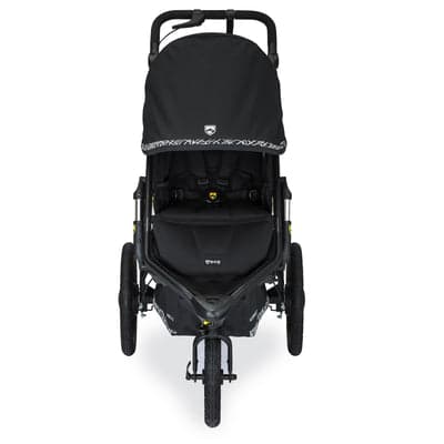 BOB Alterrain Pro jogging stroller in black with pneumatic tires on a trail path