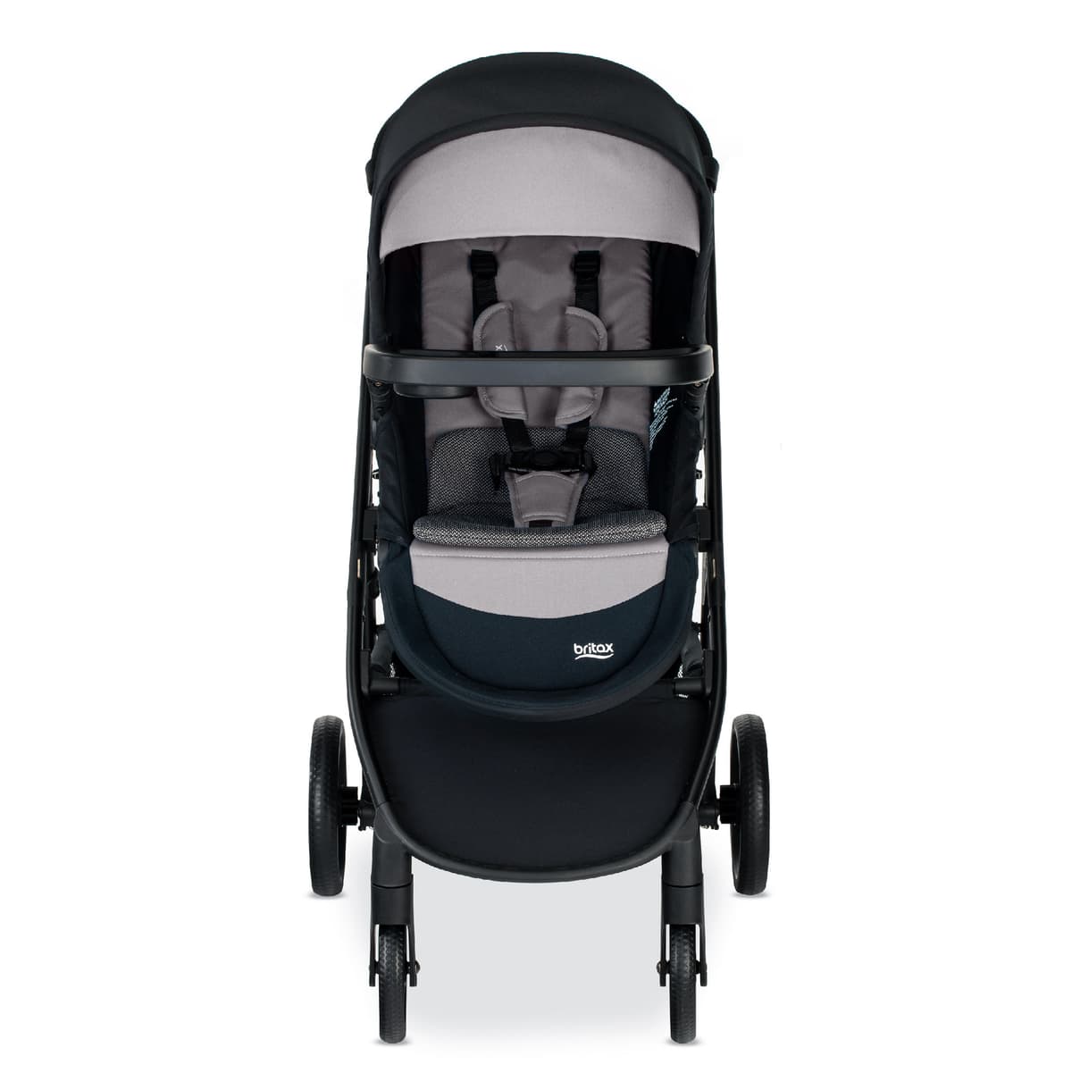 Britax Grove stroller in graphite navy with the seat parent-facing on a city sidewalk