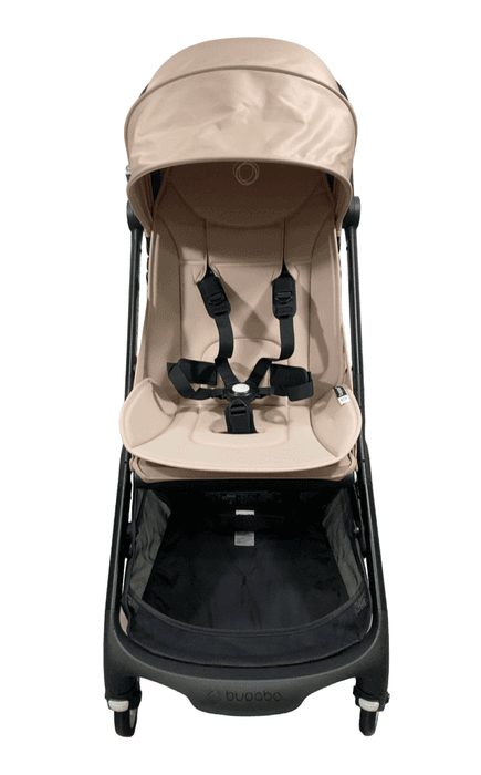 Bugaboo Butterfly stroller in midnight black folded in one second at airport departure gate