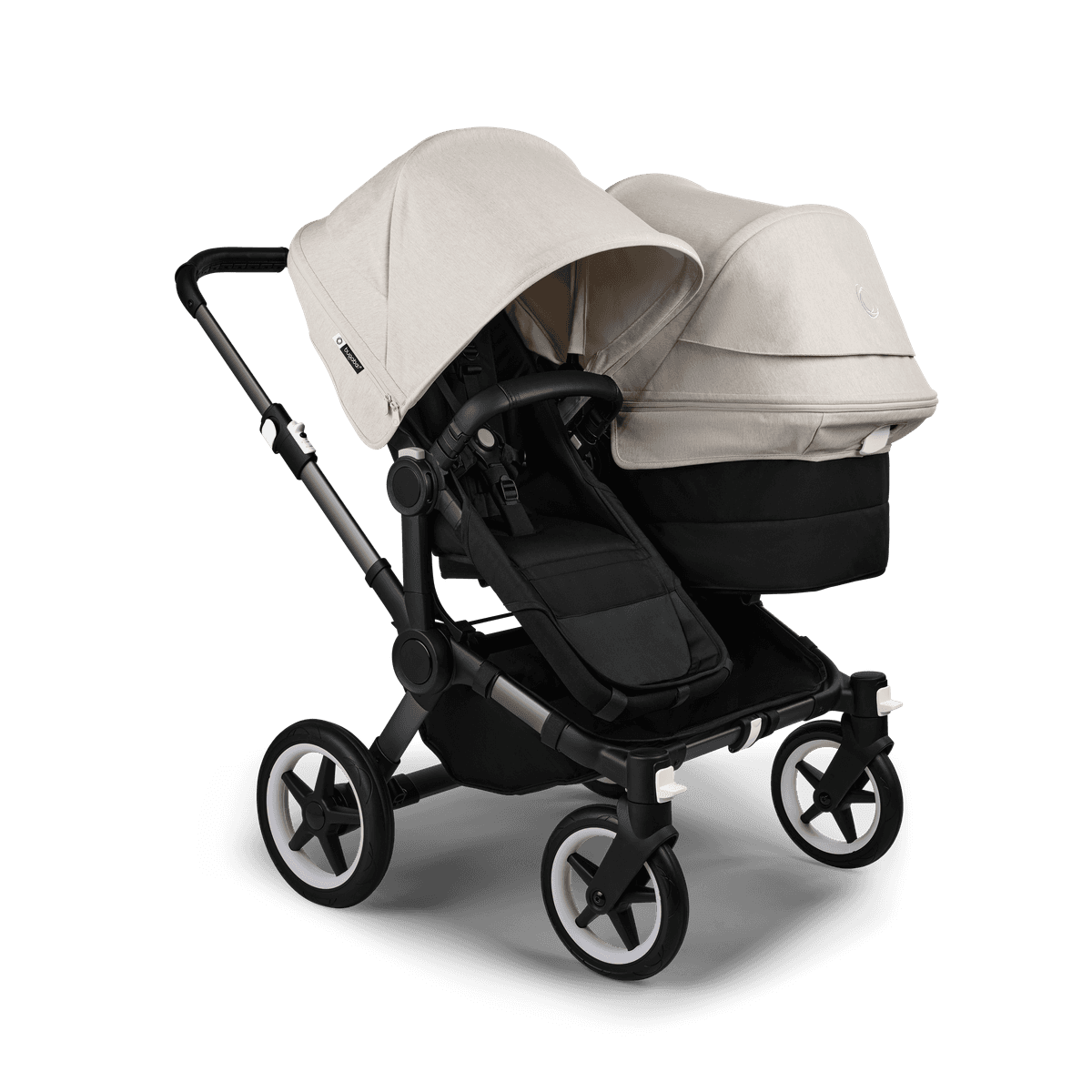 Bugaboo Donkey 5 in Duo configuration with two seats in black color on a city sidewalk