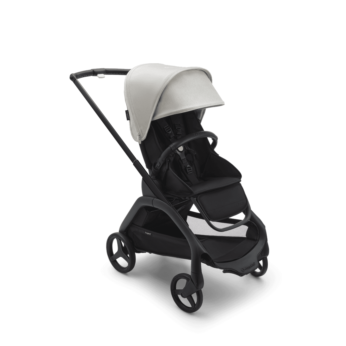 Bugaboo Dragonfly stroller in midnight black with parent-facing seat on a city sidewalk