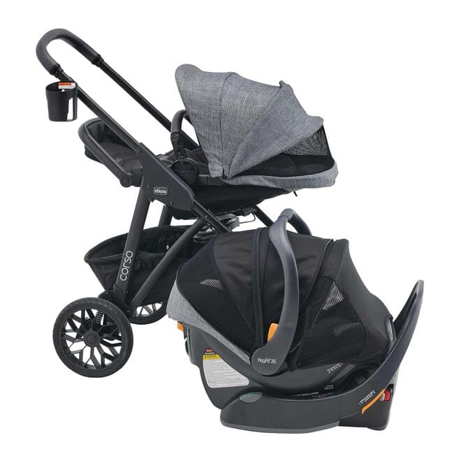 Chicco Corso Primo stroller in black with the seat forward-facing on a suburban sidewalk