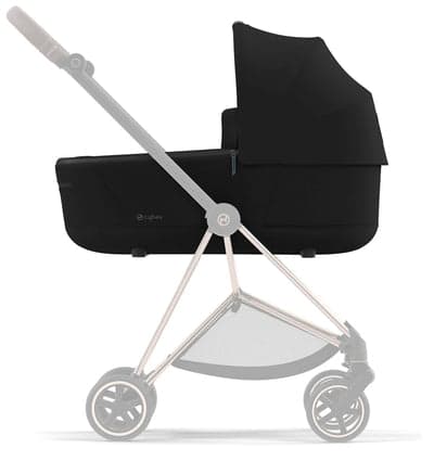 Cybex Mios 3 stroller in deep black with reversible seat on a city street