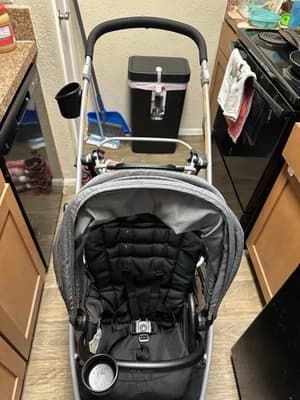 Graco Ready2Grow 2.0 sit-and-stand double stroller in Remy with toddler standing on rear platform