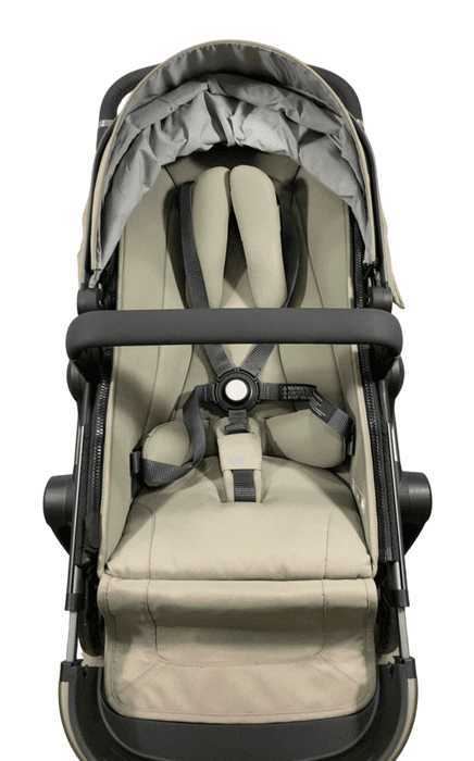 Joolz Day+ stroller in brilliant blue with bassinet on a park path in autumn