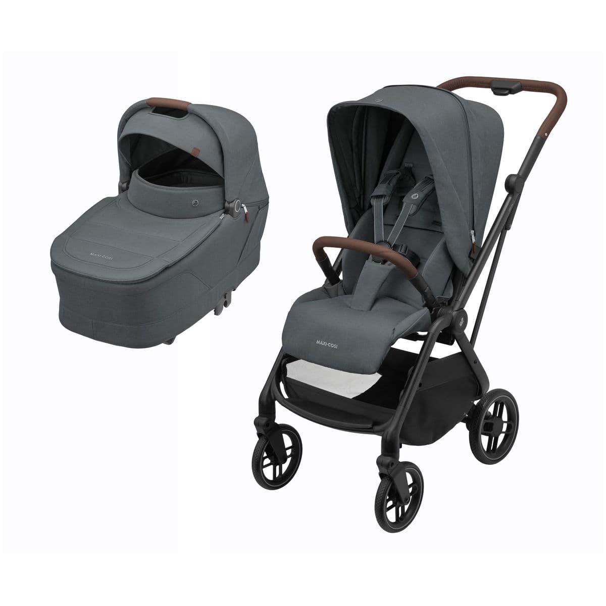 Maxi-Cosi Leona 2 stroller in black with reversible seat in parent-facing mode on a city path
