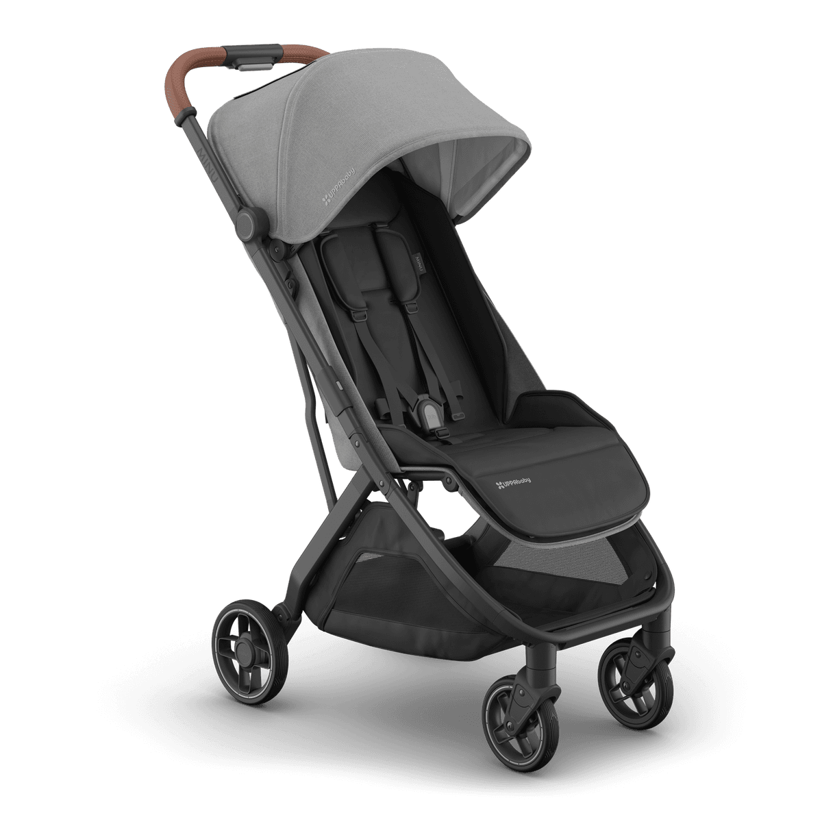 UPPAbaby Minu V3 stroller in jake black with infant in carriage mode at airport gate