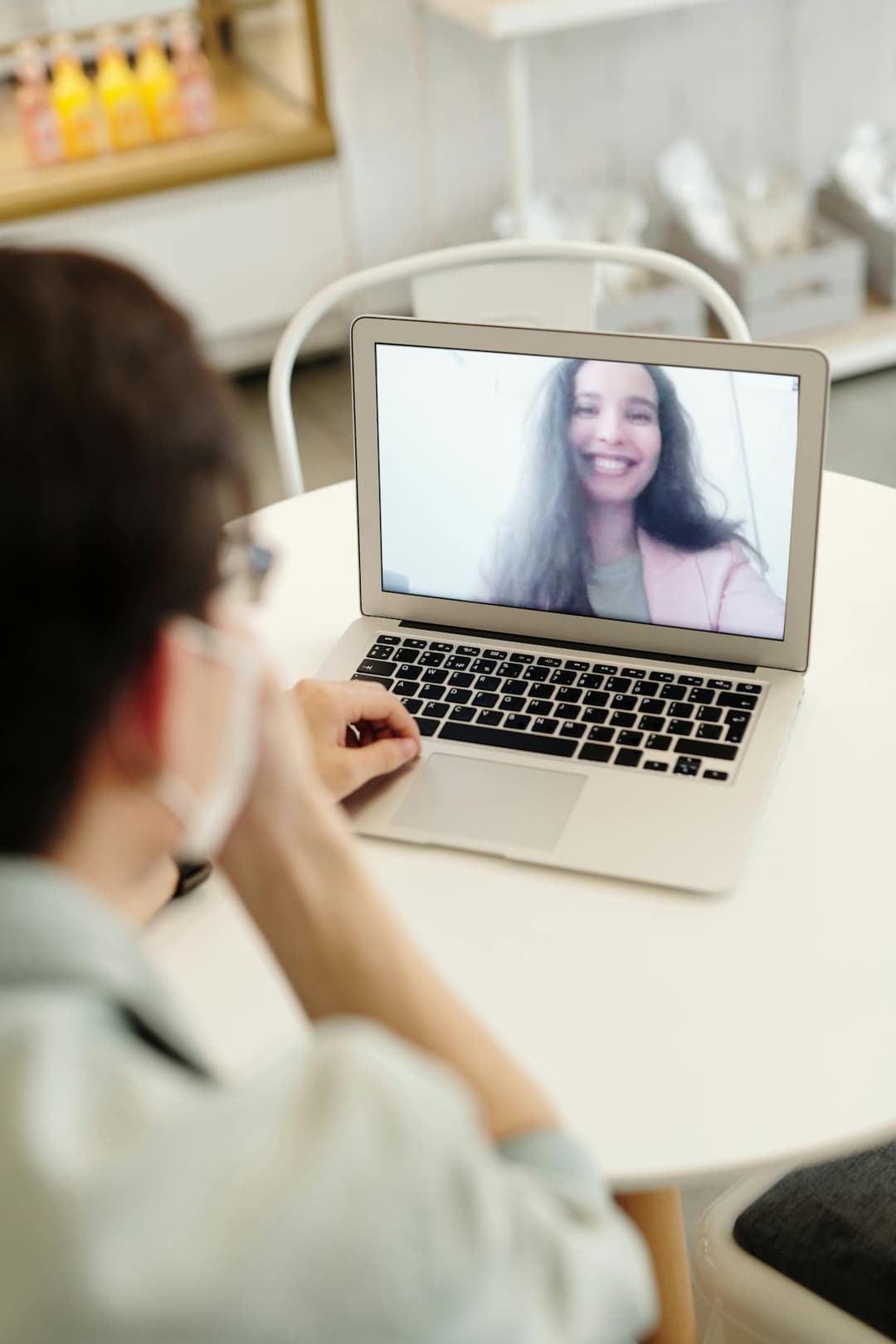 Family travel expert on a video consultation, helping parents prepare for their trip