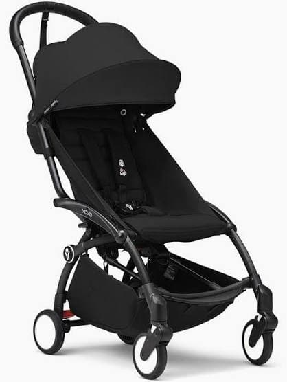 Babyzen YOYO2 stroller in white frame with black color pack folded at airplane gate