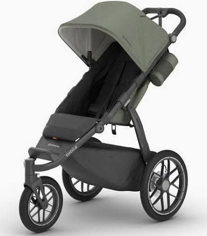 UPPAbaby Ridge V2 jogging stroller in charcoal with foam-filled tires on a paved running trail