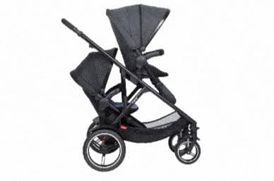 phil&teds Voyager inline double stroller in black with lie-flat main seat and double kit on an urban trail