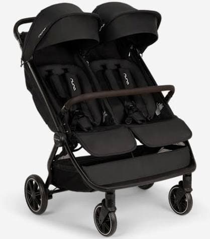 Nuna TRVL Dubl side-by-side double stroller in caviar color on an airport terminal floor