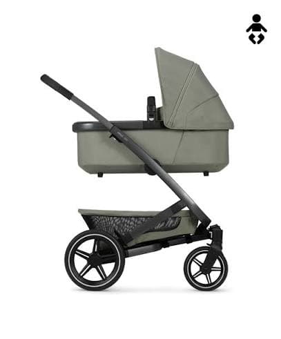 Joolz Geo 3 in Space Black in Duo configuration with upper and lower seats on a European-style city street