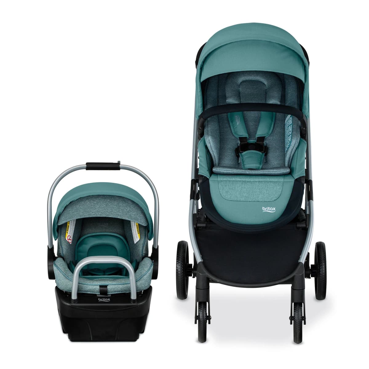 Britax Grove stroller in graphite navy with the seat parent-facing on a city sidewalk