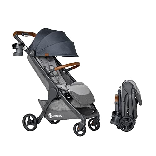 Ergobaby Metro+ Deluxe stroller in black with adjustable handlebar raised at an airport gate