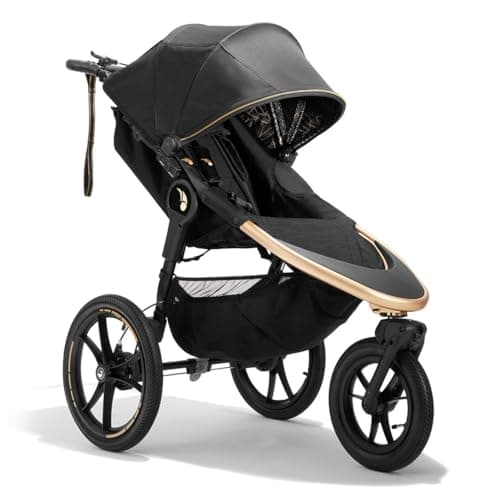 Baby Jogger Summit X3 jogging stroller in black with pneumatic tires on a paved running path