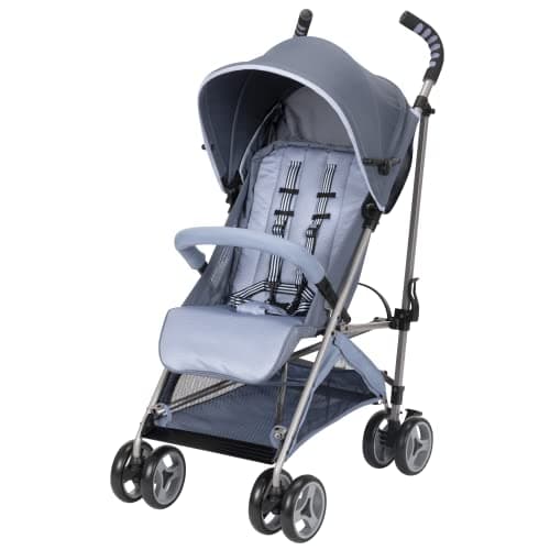 Cosco Simple Fold full-size stroller in black and grey in a home entryway, showing compact folded position