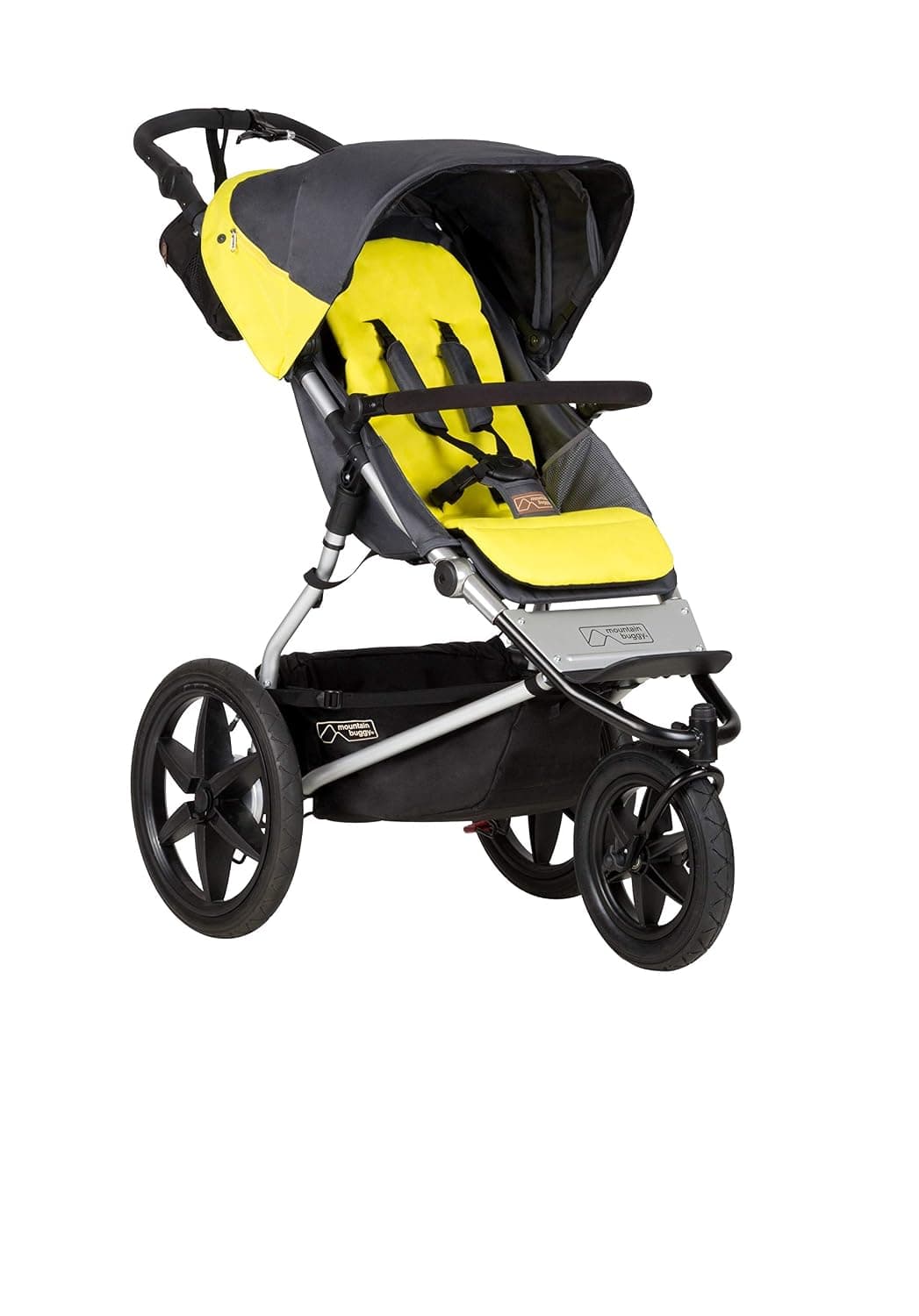 Mountain Buggy Terrain jogging stroller in black on a rugged trail with large air-filled tires