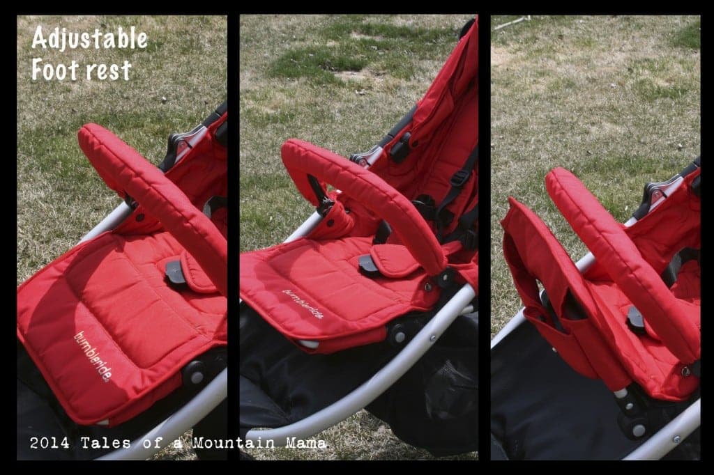 Bumbleride Indie stroller in sea glass color with air-filled tires on a forest trail path